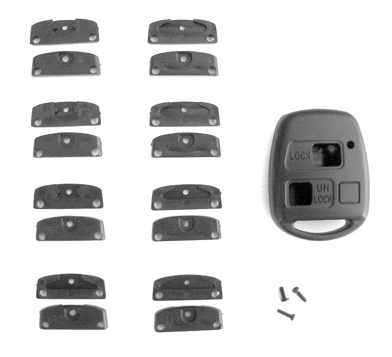 Guscio telecommando 2 o 3 tasti, con 8 adattatori